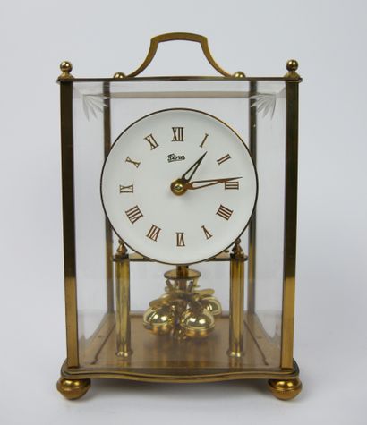 FLORA

Living room clock in gilded brass...