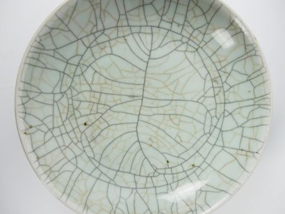 null 
CHINA 19th century




Circular porcelain bowl with a shaded celadon glaze...