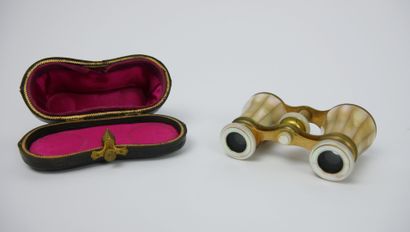 null Pair of gilt metal and mother-of-pearl inlaid theatre binoculars. In its leather...