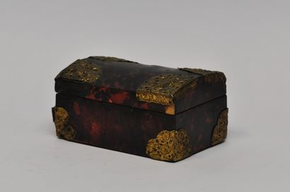 null 
Small box with a curved lid and tortoiseshell veneer decorated with cut and...