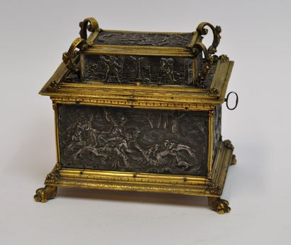 null 
Gilt brass chest decorated with chased metal plates depicting hunting scenes,...