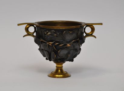 null Ferdinand BARBEDIENNE (1810-1892)

Vase en bronze doré et à patine brune à décor...