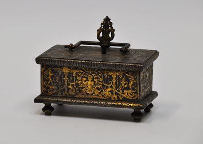 null 
Small rectangular steel chest with gold damascene decoration of satyrs, foliage,...