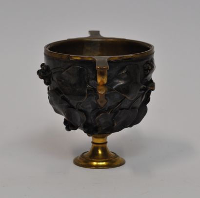 null Ferdinand BARBEDIENNE (1810-1892)

Vase en bronze doré et à patine brune à décor...