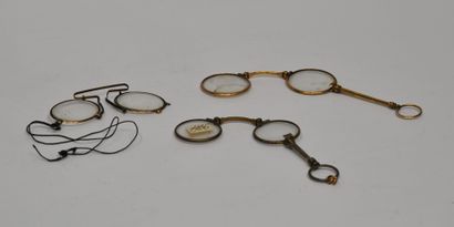 null Set of 3 gilded metal binoculars, two of which are folding and decorated with...