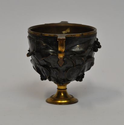 null Ferdinand BARBEDIENNE (1810-1892)

Vase en bronze doré et à patine brune à décor...