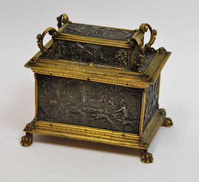 null 
Gilt brass chest decorated with chased metal plates depicting hunting scenes,...