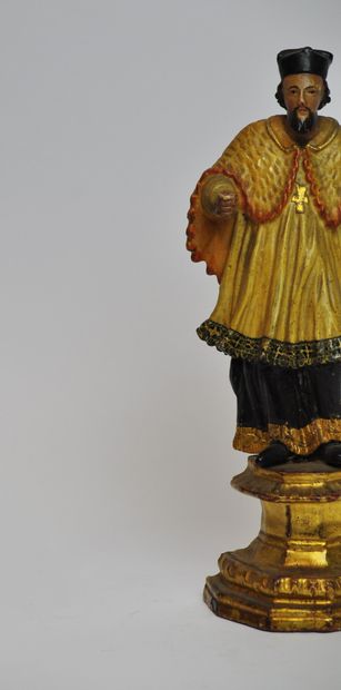 null 
Saint Jean Népomucène en bois sculpté en ronde-bosse, polychromé et doré. Coiffé...