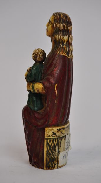 null Carved and polychrome bone sculpture representing a Virgin and Child. Work of...