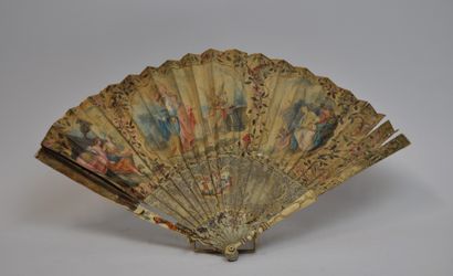 null Fan in engraved horn in rocaille style and paper with painted decoration representing...