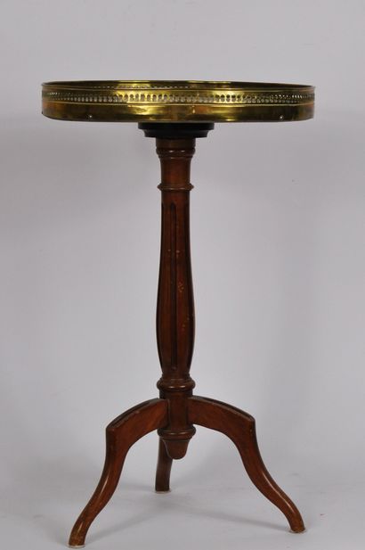  Small circular mahogany pedestal table, the marble top surrounded by an openwork...
