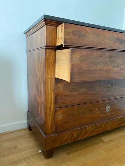 null Mahogany veneered chest of drawers opening with four drawers, three of which...