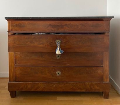 null Mahogany veneered chest of drawers opening with four drawers, three of which...