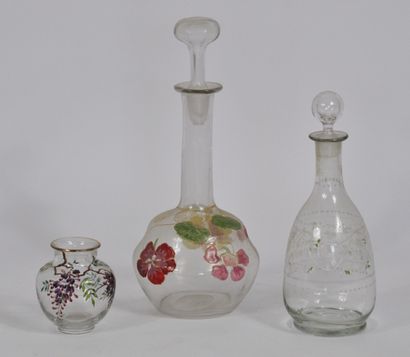 Set of 3 bottles of different shapes with...