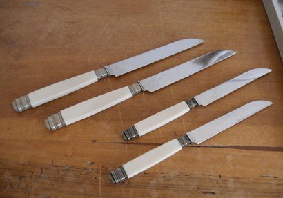 null Suite of 12 small and 12 large knives, the handle in bone. 

Length of the big...
