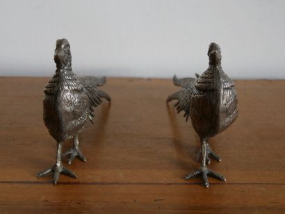 null Pair of silver plated partridges. 

Dimensions: 14 x 26 x 4 cm



Collection...