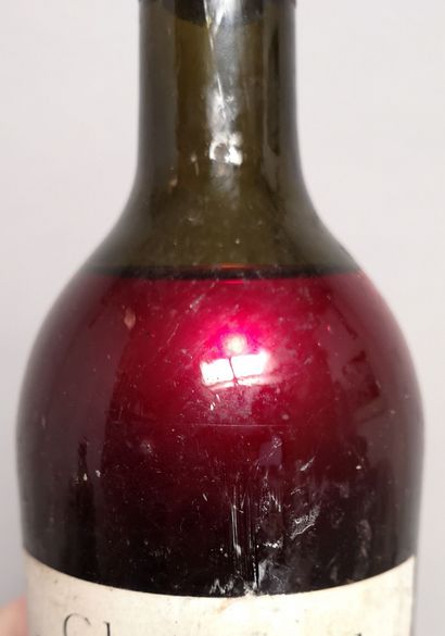 1 bouteille Château MONTALBERT - Saint Emilion 1918 Etiquette abîmée et légèrement...