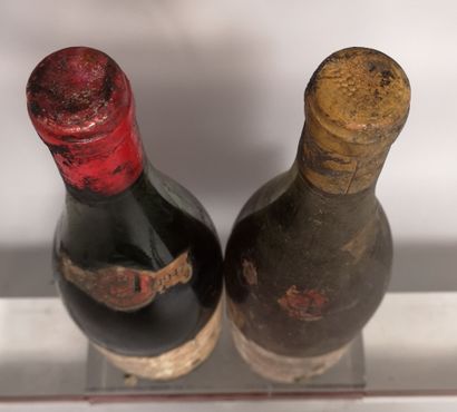  2 bouteilles Un ECHEZEAUX Grand cru 1947 et un PULIGNY MONTRACHET illisible- P....