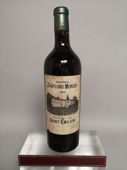 1 bouteille Château TROPLONG MONDOT - 1er cru Saint Emilion 1913 Etiquette légèrement...