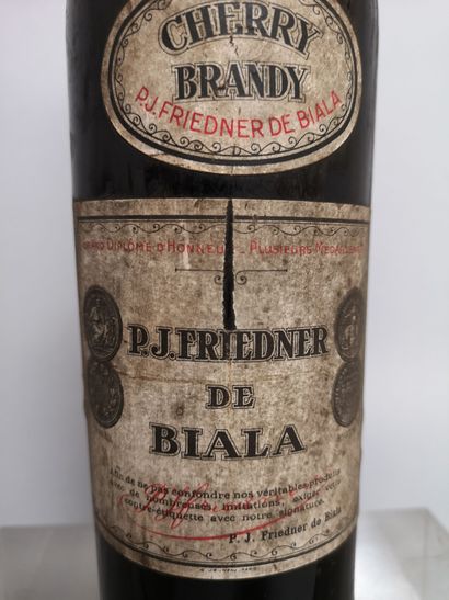 null 1 bottle CHERRY BRANDY - P.J. Friedner de BIALA Stained and slightly scratched...