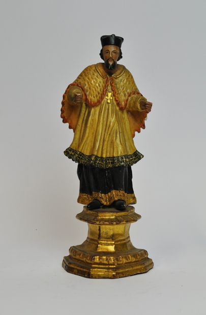 null Saint Jean Népomucène en bois sculpté en ronde-bosse, polychromé et doré. Coiffé...