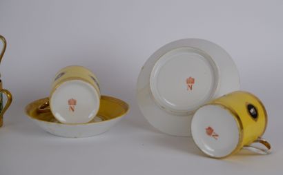 null Lot of porcelain including: 

CAPODIMONTE

Two cups and saucers in yellow and...