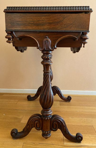 null Mahogany and mahogany veneer working table richly carved with brass and mother-of-pearl...