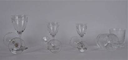 null Part of a glass service in crystal with engraved decoration of palmettes, garlands...