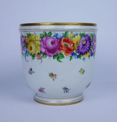 null A large white porcelain planter with a painted frieze of flowers and gold fillets....