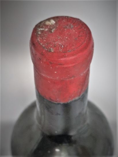 null 1 bouteille Château CANON - 1er Gcc Saint Emilion 1934 Etiquette légèremen tachée....