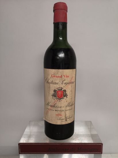 null 1 bouteille Château POUJEAUX - Moulis 1956 Etiquette tachée. Niveau mi épau...