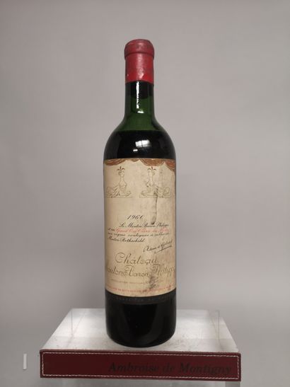 null 
1 bouteille Château MOUTON BARONNE PHILIPPE - 1er Gcc Pauillac 1960 Etiquette...