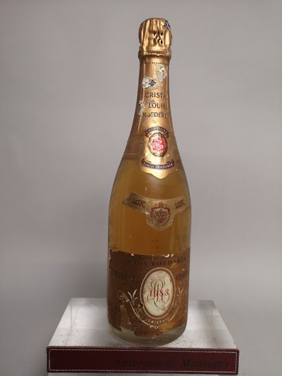 null 1 bouteille CHAMPAGNE CRISTAL de ROEDERER 1983 Etiquette abimée et déchirée,...