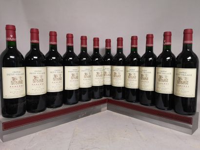 null 12 bouteilles Château PETIT VILLAGE - Pomerol 1995 En caisse bois.