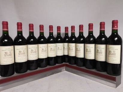 null 12 bouteilles Château PETIT VILLAGE - Pomerol 1994 En caisse bois.