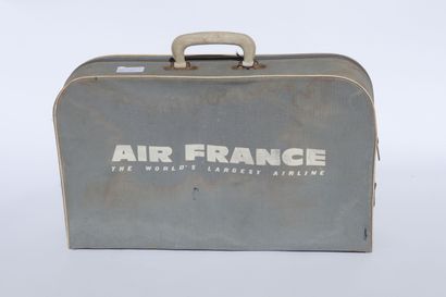 null TWO AIR FRANCE SUITCASES.

One in light blue canvas and one in plaid, plastic...