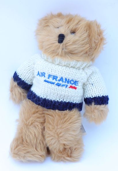null AIR FRANCE TEDDY BEAR.

With signed sweater. 

Made by A.I.R. 

Height 24 cm....