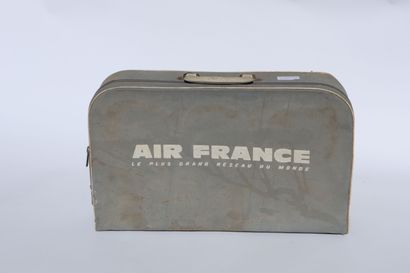null TWO AIR FRANCE SUITCASES.

One in light blue canvas and one in plaid, plastic...