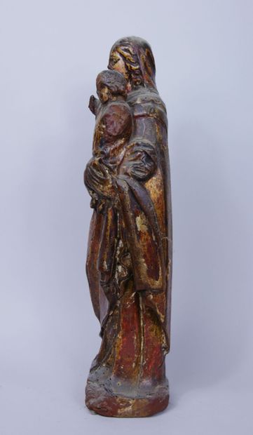 null Sculpture en bois anciennement polychrome, représentant la Vierge debout tenant...