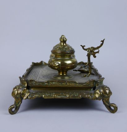 null Rectangular gilt bronze inkwell with two reservoirs and a letter opener decorated...