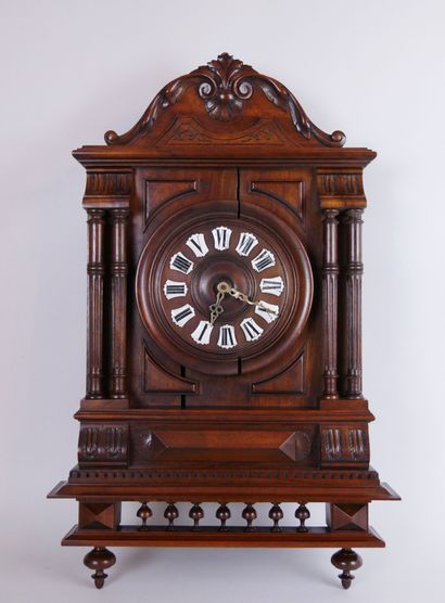 null Aneroid barometer with centigrade thermometer on a carved wooden stand decorated...