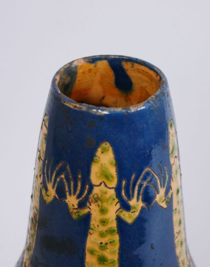 null Vase in glazed terracotta decorated with lizards and flowers. Bears a signature...