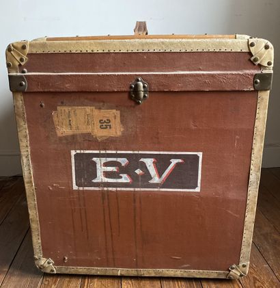 null Travel trunk with wood and metal reinforcements covered with a brown coated...