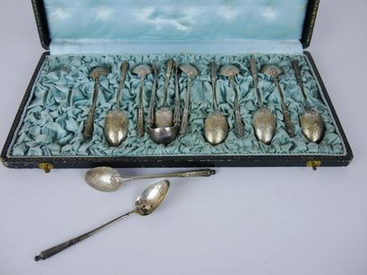 null Suite of 12 small spoons and a sugar tongs out of silver 950 thousandths with...