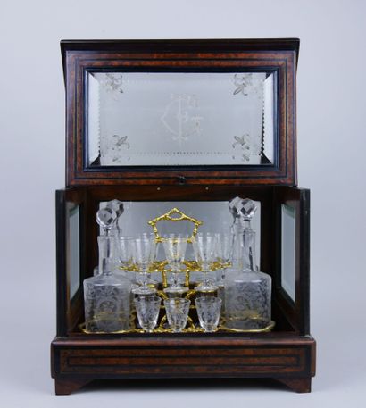 null Liqueur cabinet in veneer underlined by a blackened wood fillet marquetry decorated...