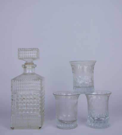null Lot of glassware including: 

3 whiskey or rum decanters in glass with geometric...