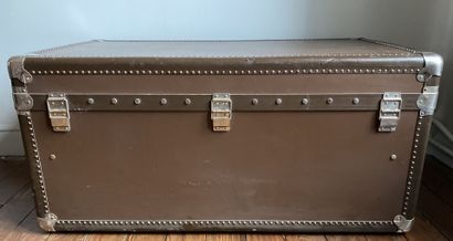 null Travel trunk covered with a brown coated canvas studded imitation leather with...