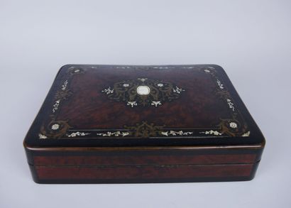 null Wooden game box decorated with ivory marquetry scrolls and brass fillets containing...