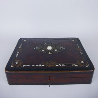 null Wooden game box decorated with ivory marquetry scrolls and brass fillets containing...