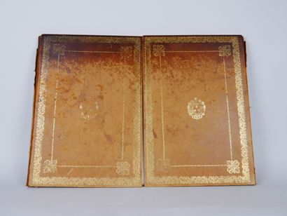 null Office equipment in tan leather with gilded decoration in imitation of the gilding...